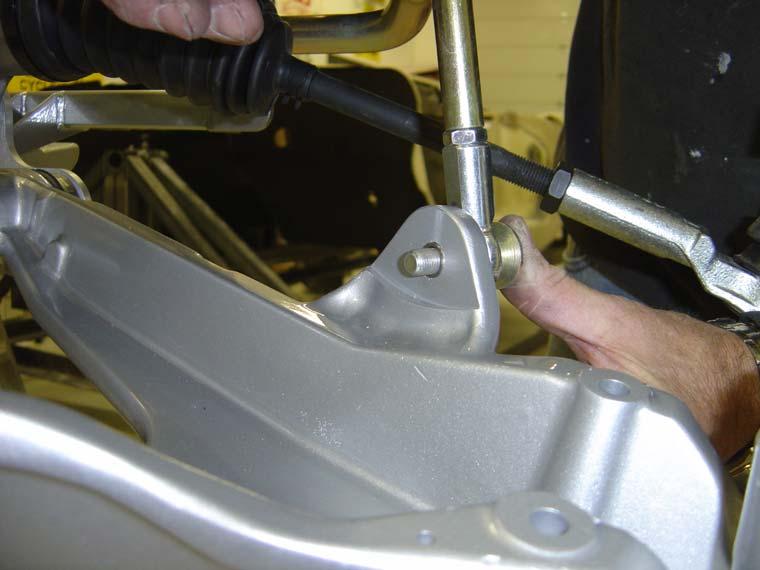 (11) The lower sway bar mounts from the back side as pictured below.