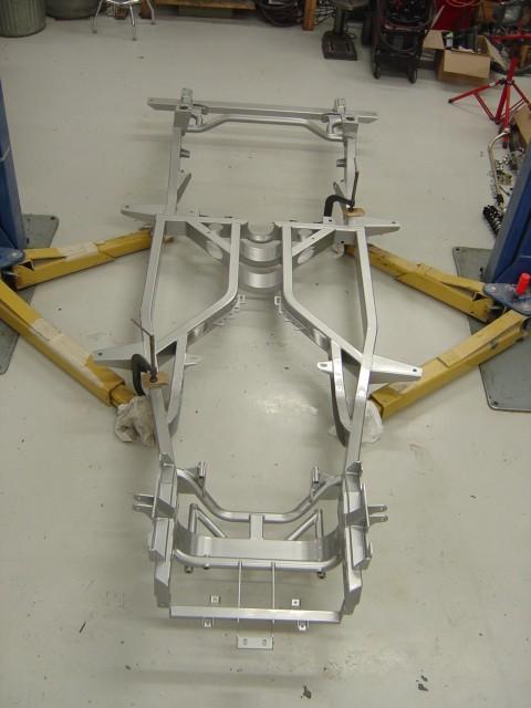 This series will cover the chassis assembly: (1) Bare frame powder coated and ready for assembly.