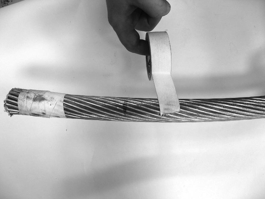 Step #4 Apply tape approximately 1" back from the cutting mark to secure the