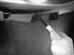 Install the speed clip that is provided onto the sheet metal just behind the left