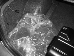 24. Remove the bag from the subwoofer assembly and lay it in the corner of the