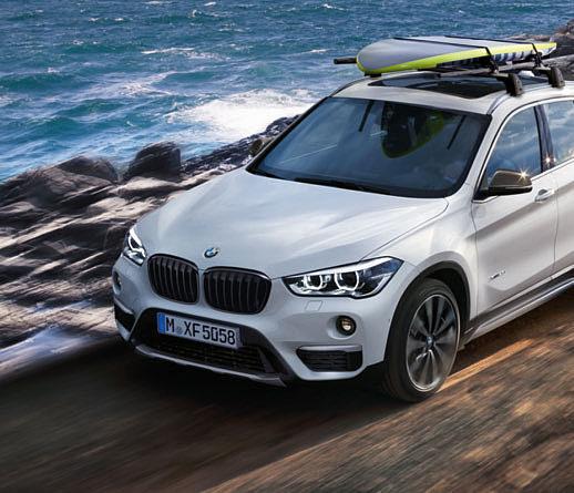 0 TRANSPORT & LUGGAGE SOLUTIONS ROOF RACK SYSTEMS The BMW roof and rail carriers