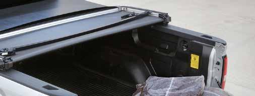 TONNEAU COVERS The available soft cover shields cargo and easily rolls up to allow
