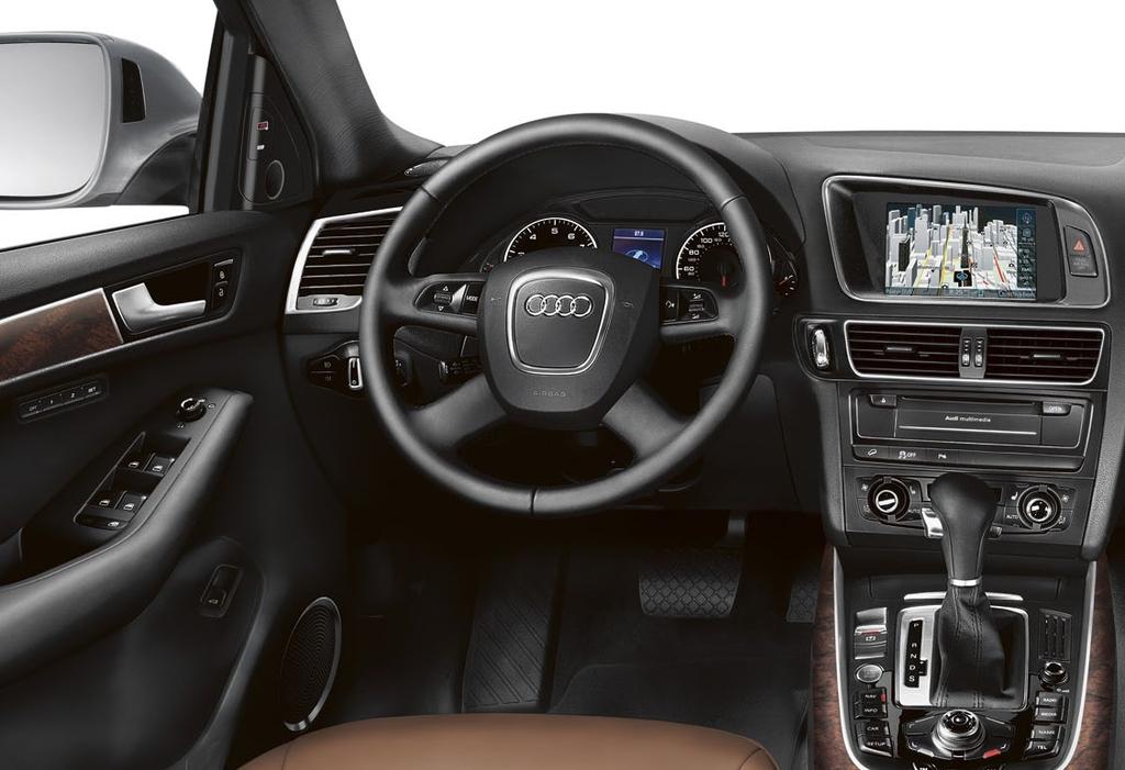 In here, it s all about you. Speaking to the detail and craftsmanship of the Q5 are premium genuine wood inlays.
