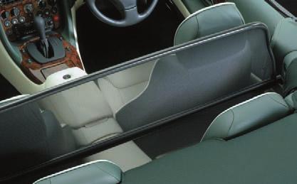 Wind deflector Designed to reduce turbulence for both passenger and driver, the DB7 Volante wind deflector is fitted in