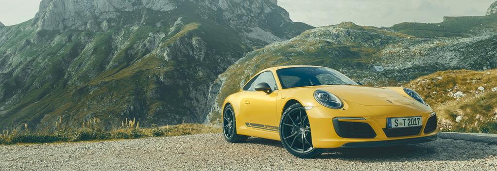 Exterior design. Take a quick break. Enjoy the view. You might find it difficult, but it's something we recommend: pull over, get out, and stop for a while. Feast your eyes on the new 911 Carrera T.