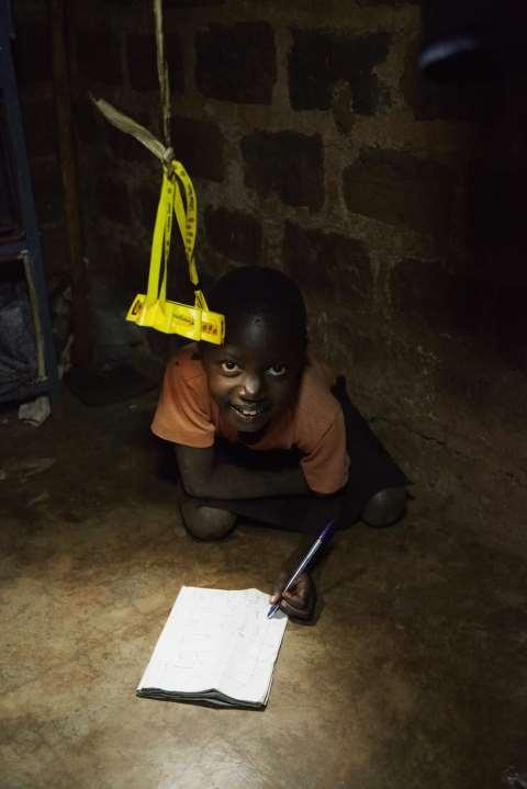 02 per sold kilowatt which allows to distribute two solar lamps on average per household a year; (2) pay DKK 100 to send a solar lamp to Uganda; (3) buy a
