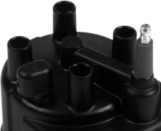 distributor cap. Secure the Power Tower to the cap using the brass contact terminal.