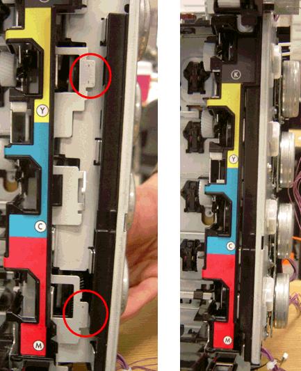 holes from larger gears should both be showing as illustrated by the red circles. (The large gears are under the frame and driven by the smaller gears.) 18.
