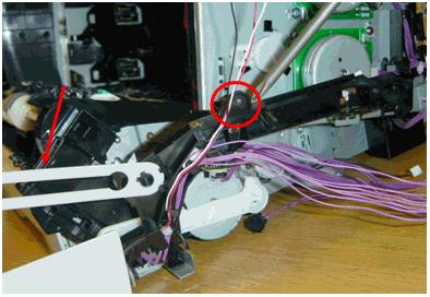 8. Remove the main drive assembly (MDA). There are six screws attaching the MDA to the chassis. Carefully note the locations of the screws to be removed.