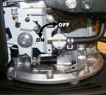 NOTE: The Briggs & Stratton engine utilizes an automatic throttle control and choke (starting) system so there is no throttle lever. c. Place your foot on the side of the deck to hold the unit while pulling the recoil starter.