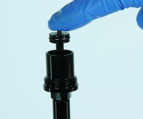 Do not allow the shaft to compress during poppet valve
