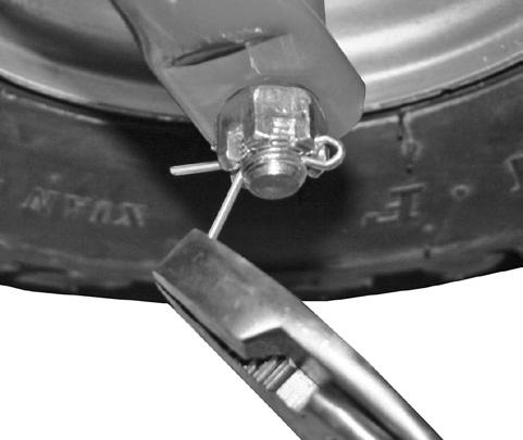 Castle Nut Cotter Pin Castle nut cover Left Small wheel spacer left side 2. Place castle nut on end of axle and tighten snug.