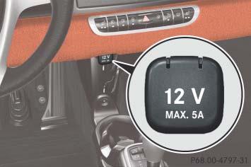 Useful features The auxiliary power outlet is located in the lower center console. P68.