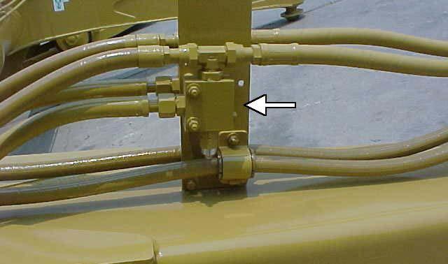 23 Troubleshooting Sequence Valve Adjusting The sequence valve on driver side (lh) of machine is to move the apron (gate) first before the ejector (pusher) moves and sequence valve on passenger side