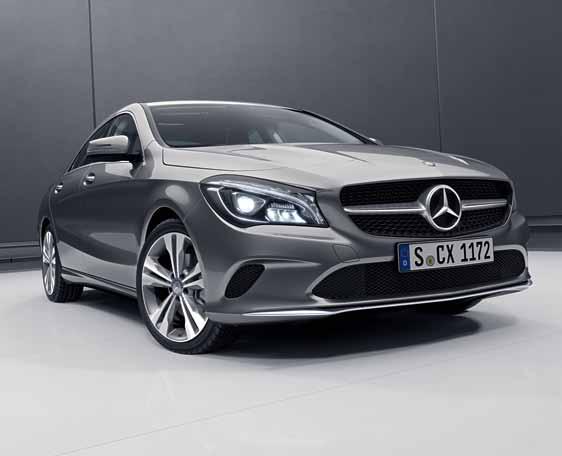 high-gloss black, 45.7 cm (18-inch) 5-twin-spoke light-alloy wheels and the two-pipe exhaust system with chrome-plated tailpipe trim.