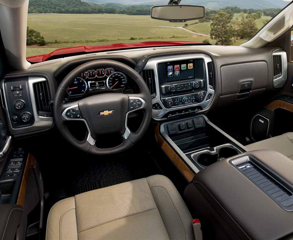 Silverado 1500 Crew Cab LTZ interior in Dune with perforated leather appointments, Cocoa interior accents and available features. DESIGNED FOR ALL-DAY COMFORT.