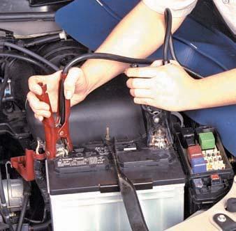 P6 6 Carefully install the gauge into the spark plug hole of