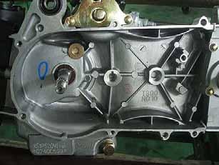 Remove the cam chain. Never pry out the connection surfaces of crankcases as separating.