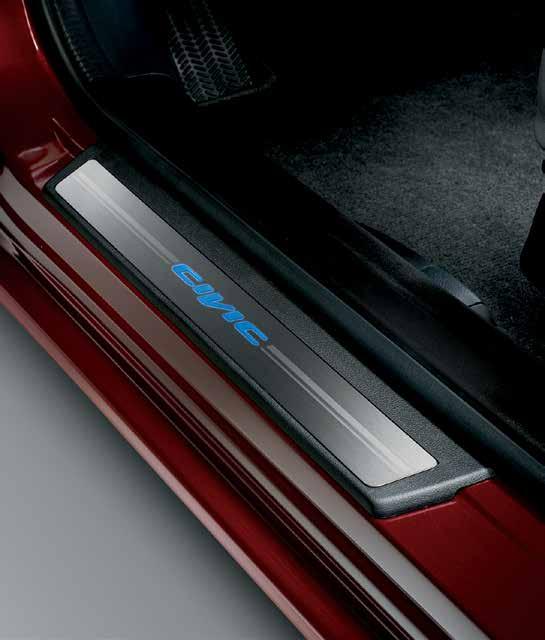DOOR SILL TRIM, ILLUMINATED Enhances the interior ambiance while protecting the lower door sill from scuff marks Blue LED lights illuminate the model s name when the door is open, providing an
