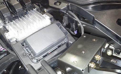 4. Shift mounting bracket towards the front of the vehicle, away from area for the LED s, as shown in Figure