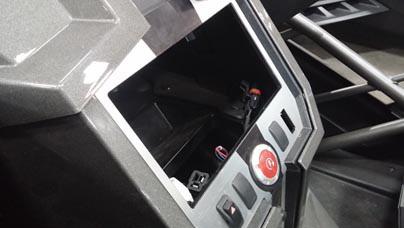7. Remove rightmost switch blank (K) in center console as shown in Figure 7.