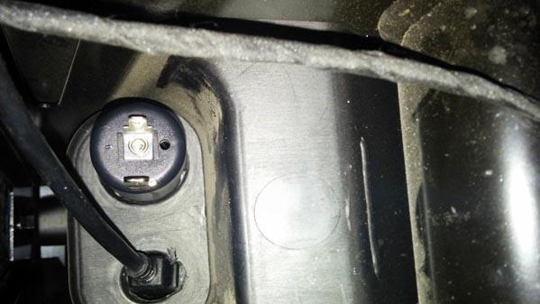 5. Disconnect wire from center terminal at DC power socket (backside of cigarette outlet inside the glovebox in the passenger side).
