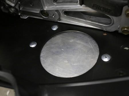 Use the attached template to locate muffler hole location,