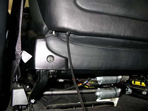I routed the wires down to a gap between the seat frame and the seat back cover on the