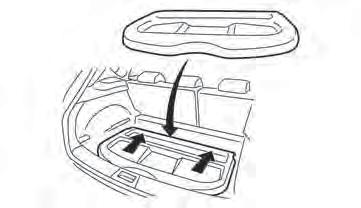 NIC2209 CAUTION Make sure the parcel shelf is carefully stored when not in use in order to prevent any damage.
