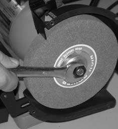 Allow the belt to come up to a steady speed for at least one minute. 6. Place the workpiece on the tool rest. 7. Slowly move the workpiece towards the belt until it lightly touches.