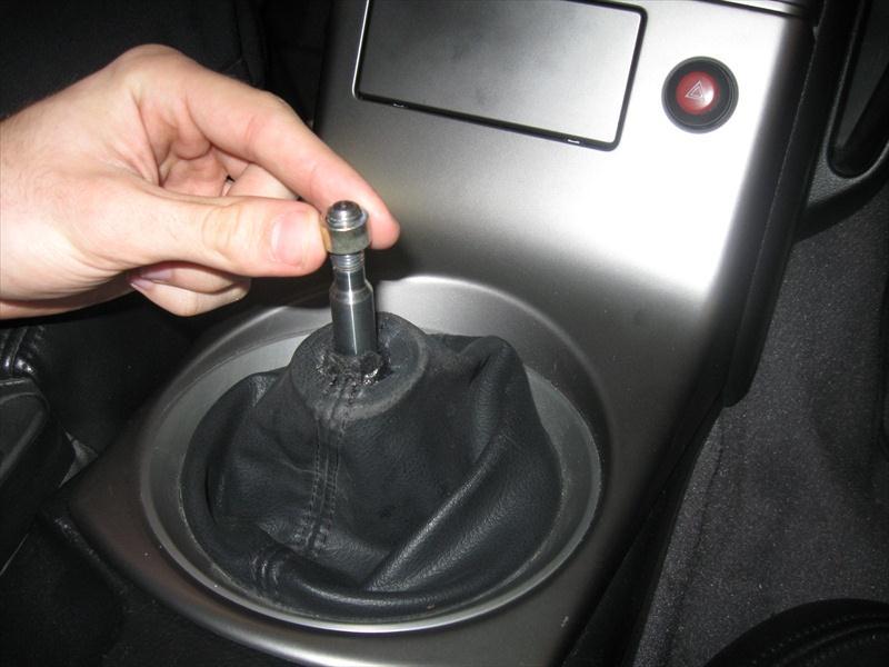 This step may require the use of a strap wrench because the shift knob is glued in