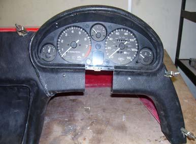 correct position and mark around the domed section that is on top of the scuttle Mark around the back of the dashboard bulge for the clock cluster The dashboard in position on the scuttle Trim about