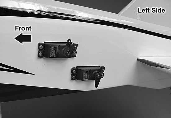 Fit the CA hinge into the slot in the fuselage and the nylon tab on the tail wheel wire into the slot below the CA hinge slot.