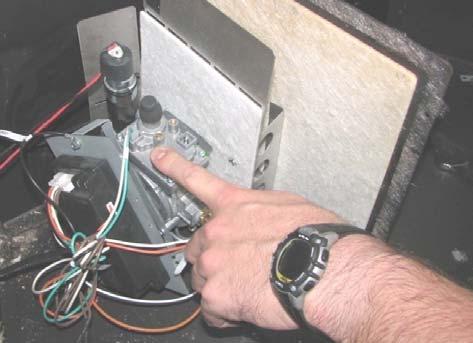 9. Remove the burner flame control connector from the valve (green and white wire). 10. Remove the battery box connector from the receiver module (4 wire connector). 11.