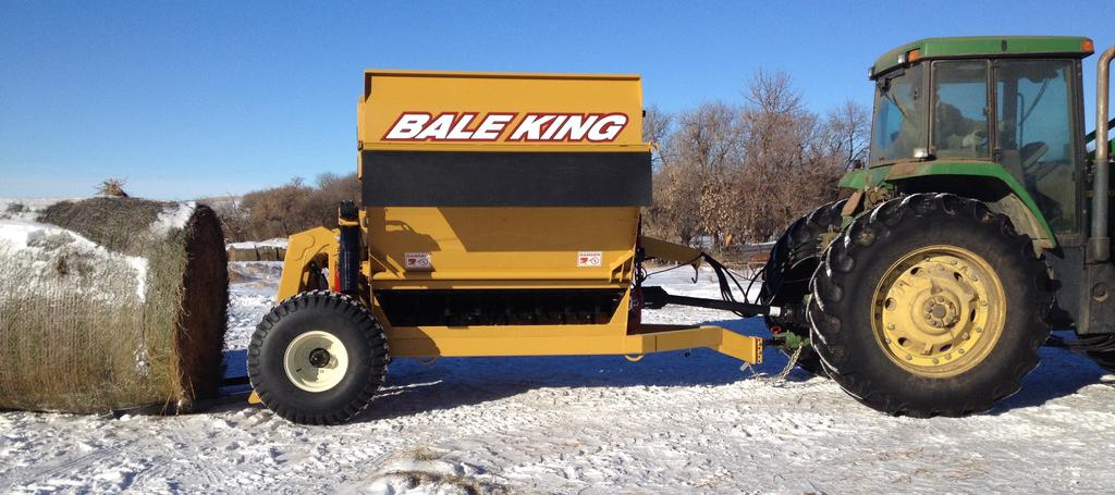 Loading Bales When loading Bales into your Bale King bale processor, the following procedure should be followed: Position the tractor and the Bale King so as to be lined up to back straight into the