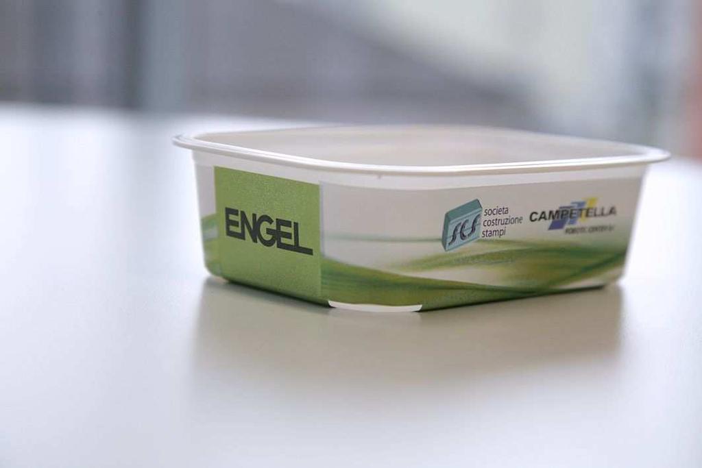 Ready-to-fill in a single step: the margarine tubs are produced by an all-electric ENGEL e-motion