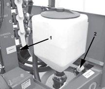 Turn the manual 3 way ball valve identified as Valve E (located under platform on left side of sprayer) to Product Tank (Point handle toward rear of sprayer).