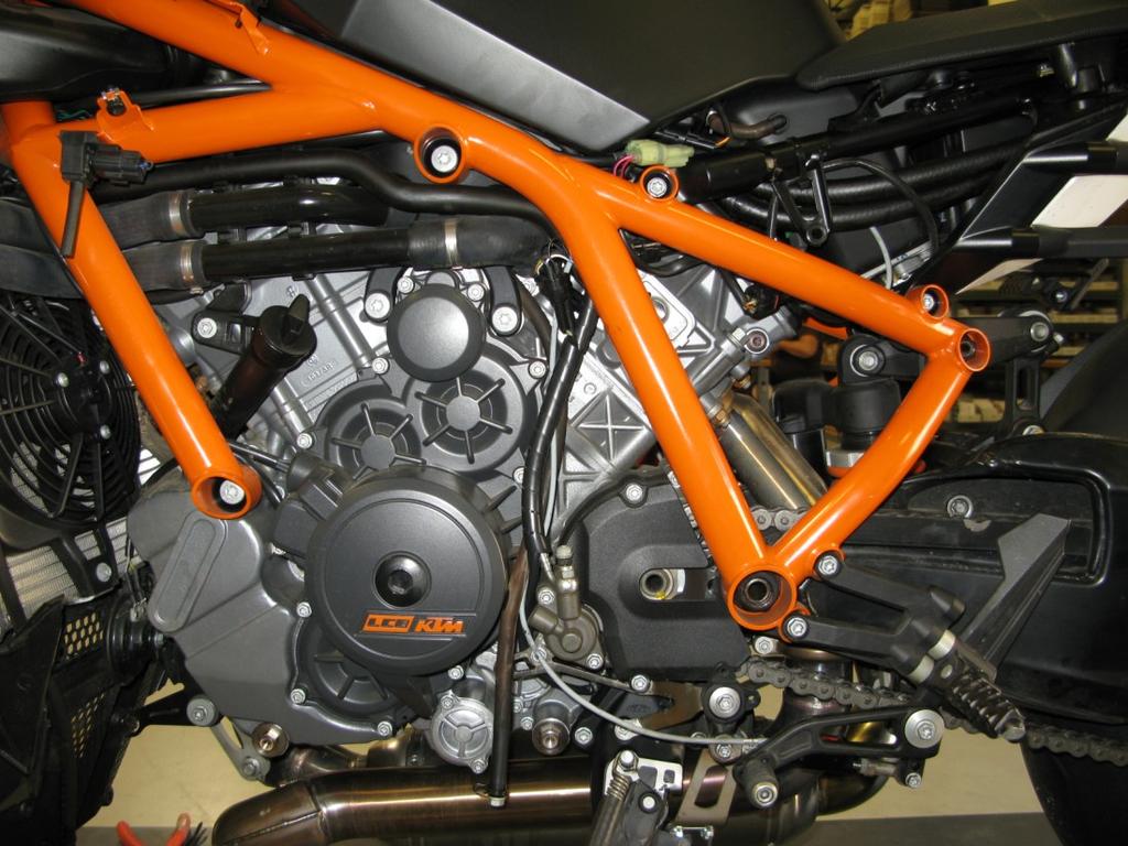Locate the crank position sensor s on the factory harness, which are blue in color and can be found near the left air inlet