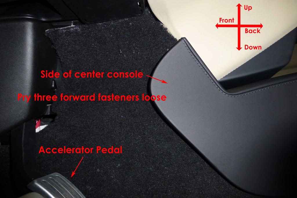 Installation of a Tekonsha Prodigy P2 Trailer Brake Step 2: Loosen the side of the center console Gently pry the forward edge of the center console to the left of the vehicle to release at least