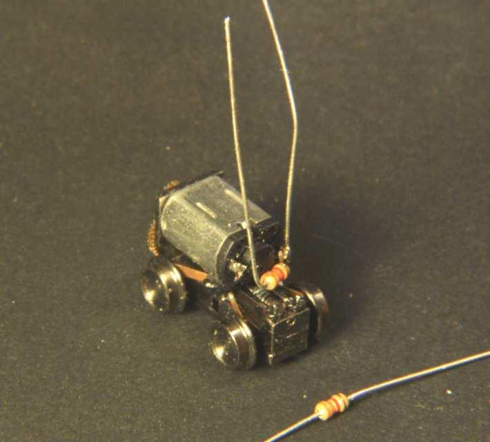 16 Bend resistor leads to form U, and solder to one pole of motor; trim leads as shown in