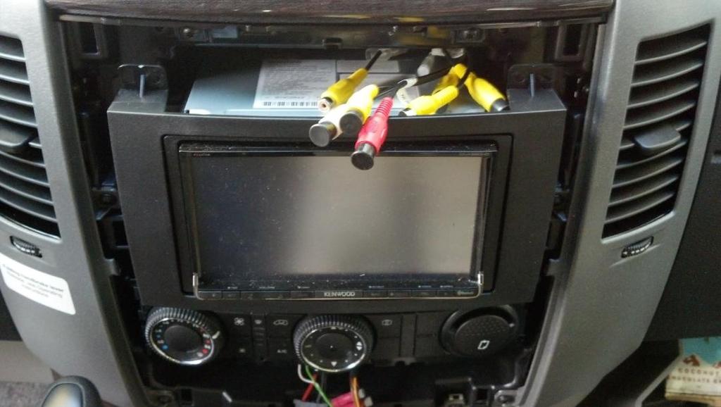 Now examine the wiring, you are looking for the video RCA type connector; they should be mark Rear Camera and Front Camera.