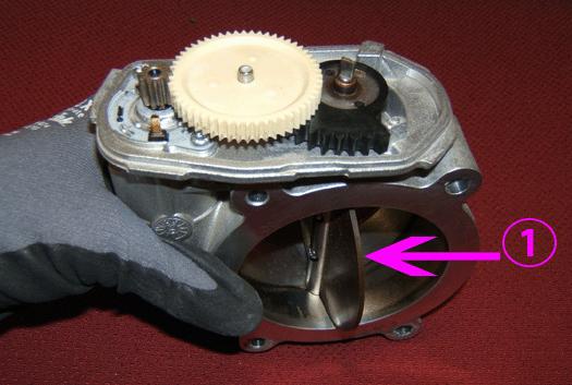 Grasp and hold the throttle body in the previously hand held upward position.