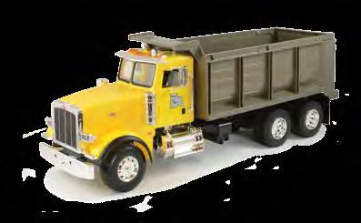 lights and sounds. Truck features opening cab doors, sliding and tilting trailer bed.