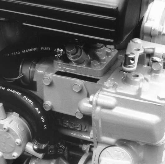 The Mitsubishi engine serial number is stamped on the fuel injection