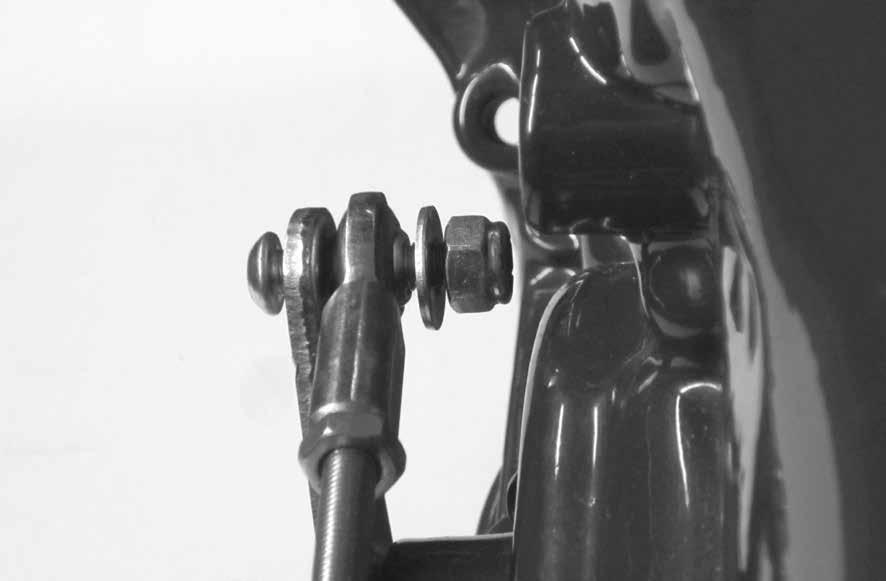 10. The button head bolts can be installed from either direction, but make sure the rod end is sandwiched between the flat washer and the trans gear lever or quad lever.