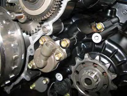ENGINE DISASSEMBLY Clutch actuator removal - Loosen the two screws (1) and screw (1a) of the