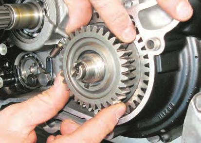 ENGINE DISASSEMBLY - Remove clutch housing drive gear (11) and