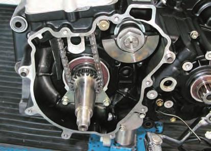 Fit the gasket to the crankcase, locate the starter motor (7) to its flange (8) and install on