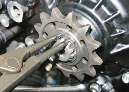 ENGINE REASSEMBLY Sprocket installation Fit the